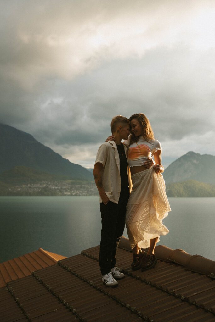 Couple on a rooftop during sunset