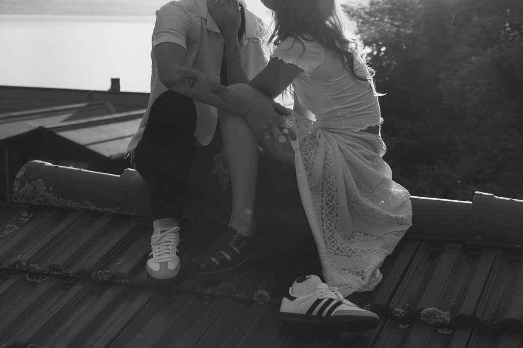 Couple on a rooftop during sunset