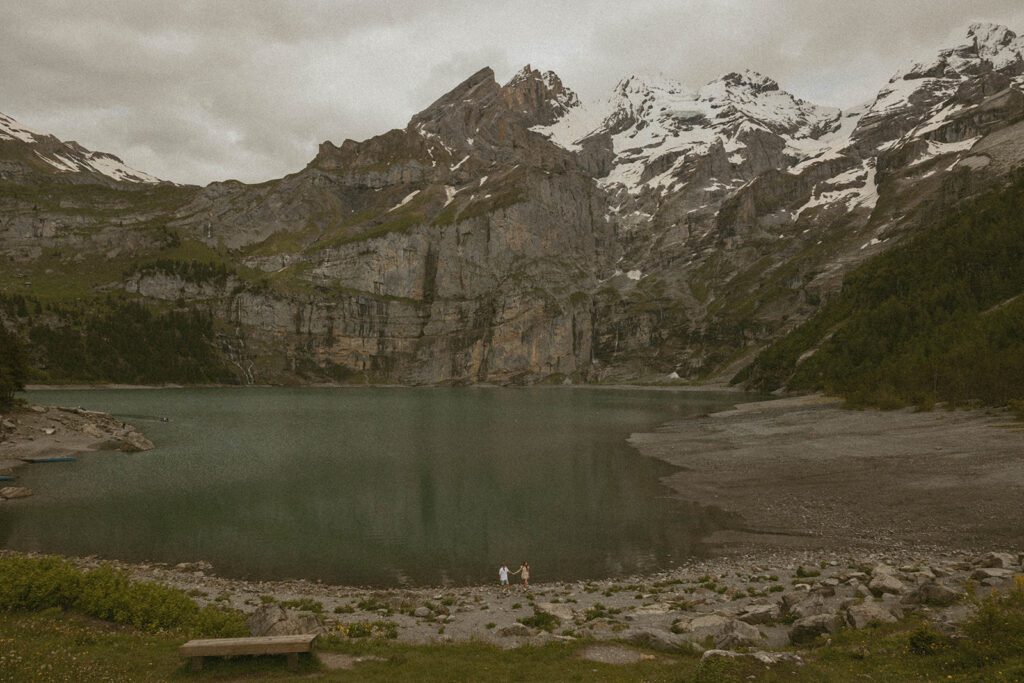 Couple at a lake in the Swiss Alps