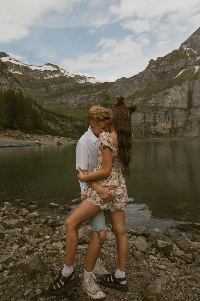 Couple at a lake in the Swiss Alps