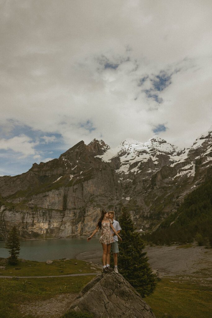 Couple at a lake in the Swiss Alps